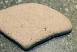 Gerald, a flat beige rock